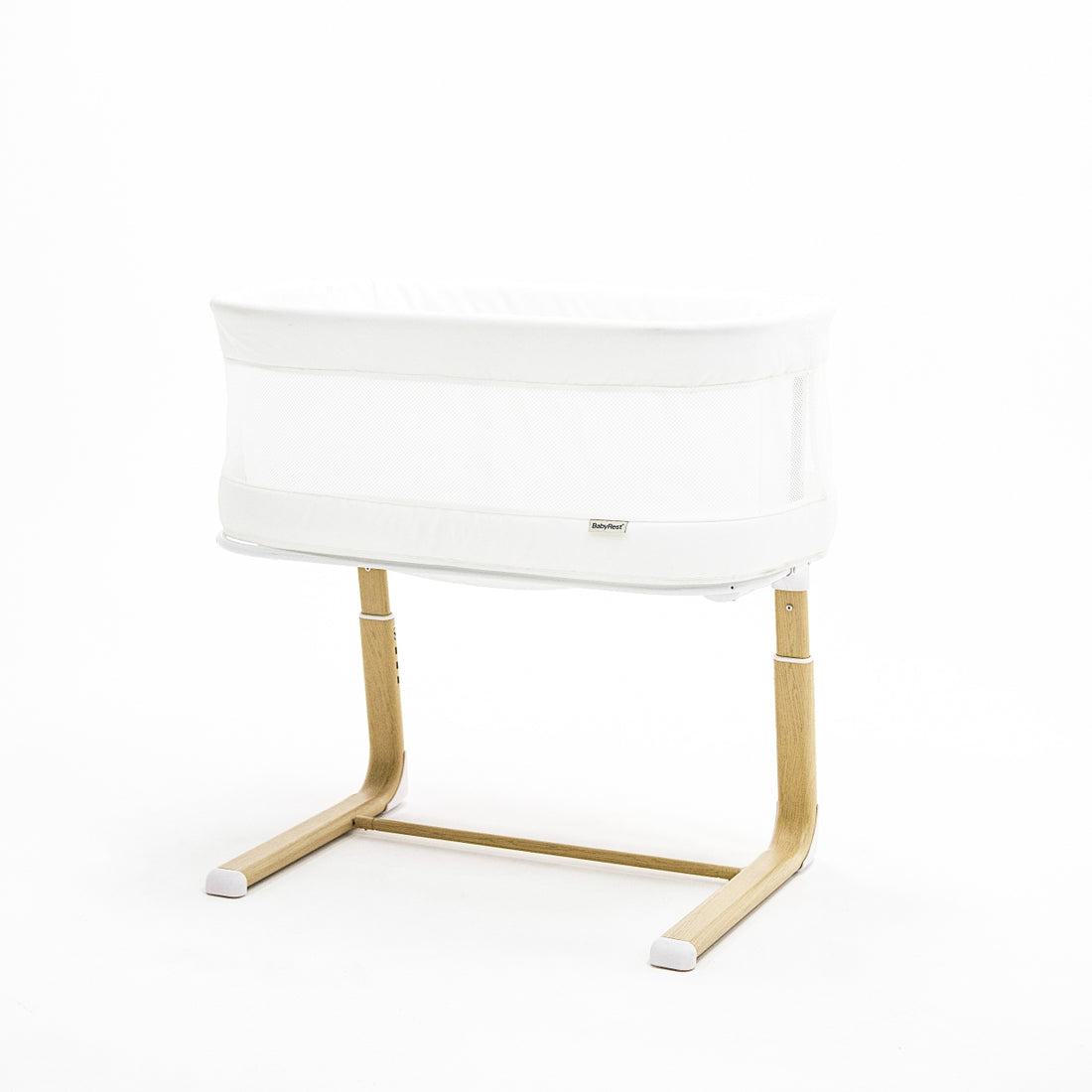 White nightstand with wooden legs on a white background