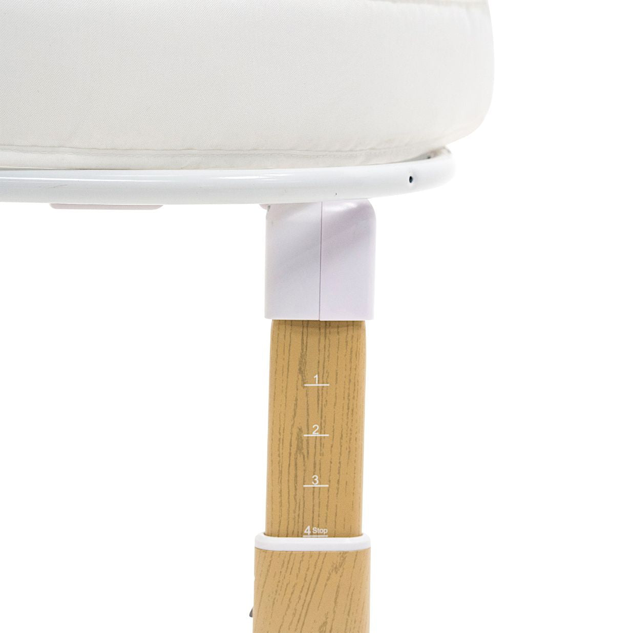 Close-up of a table leg with a white base and wooden finish on a white background