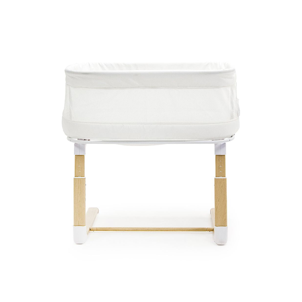 White crib with wooden legs on a white background